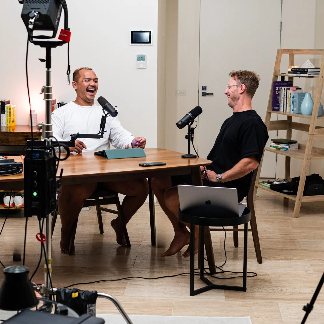 Mario and Brando laughing while recording the podcast